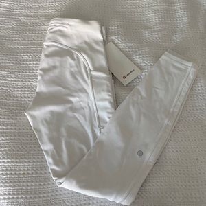 Lululemon white running leggings or spandex. New with tags (NWT). Size 6.